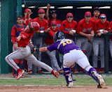 Lemoore's Gavin Kyker tags out Tulare Western's Bryson Anderson in the sixth inning of Wednesday night's home game in Lemoore. 